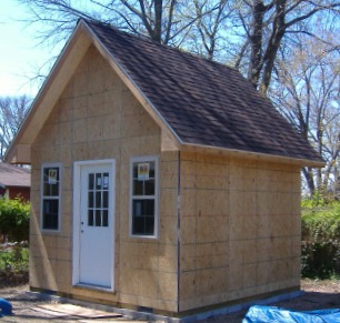 Right: Gable shed with 12/12 pitch with one foot wood overhang. Owner 